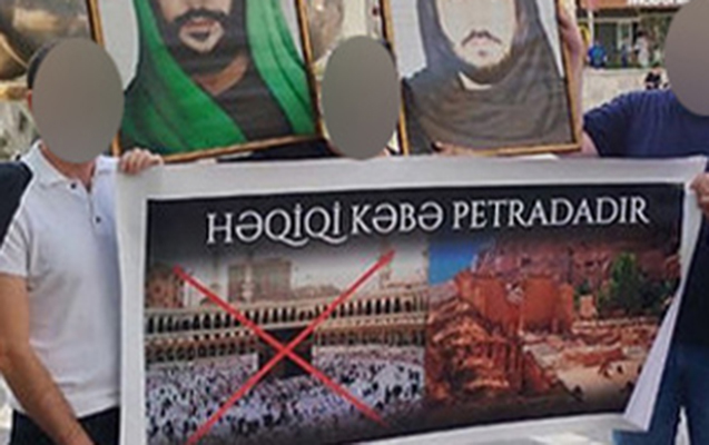 &ldquo;28 Mall&rdquo;un qarşısında plakat açan təriqət üzvləri həbs olunub